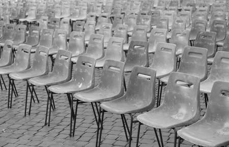 many empty grey chairs before the eventの写真素材