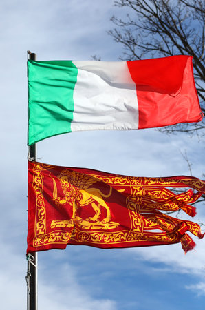 Italian flag and the Flag of Veneto Region with winged Lion