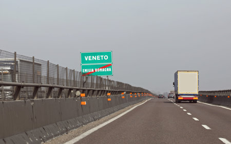 Border between italian Region called VENETO ad EMILIA ROMAGNA on the motorway bridge over the Po...