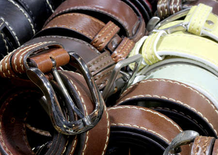 leather belts for sale in the artisan workshopの写真素材
