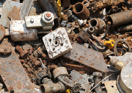 metals and broken abandoned rusty objects in recycling for the separate collection of recyclable...