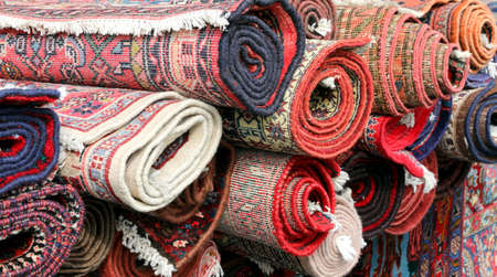 many persian rugs for sale at marketの写真素材