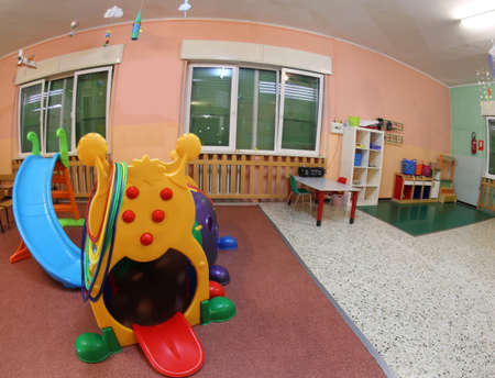 inside the wide hall of a kindergarten the games to entertain children during the dayのeditorial素材