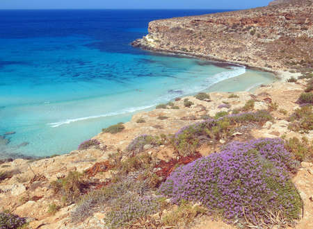 Blue Mediterranean Sea of the Lampedusa Island in South Italyの写真素材
