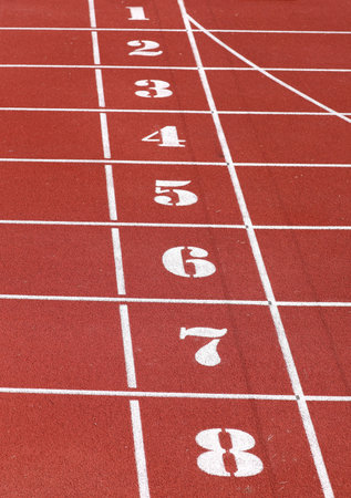 numbers from one to eight of the athletics track lane before the speed race arrives