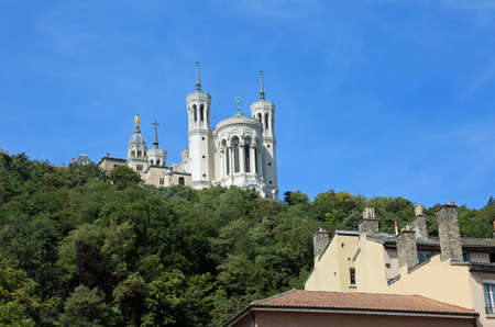 Hill with on top the Basilica of Notre Dame de fourviere in Lyon Franceの写真素材