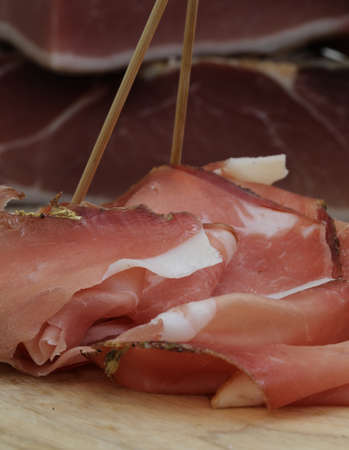 slices of cold cuts at italian restaurantの写真素材