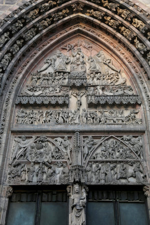 Nuremberg, Germany - August 15, 2016: Detail of big Door of the Ancient Cathedral called...