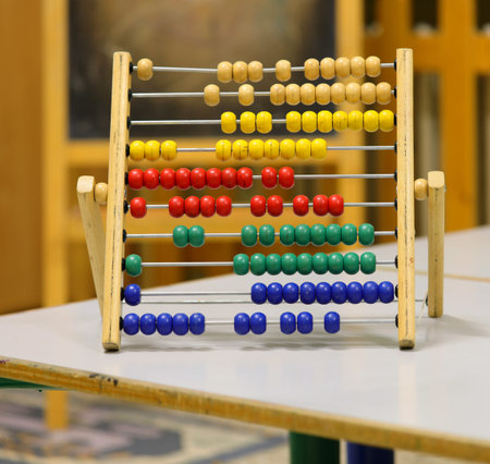 ancient wooden abacus to learn how to count inside the  classroom of a school