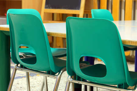 green small chairs in the classroom of the schoolの写真素材