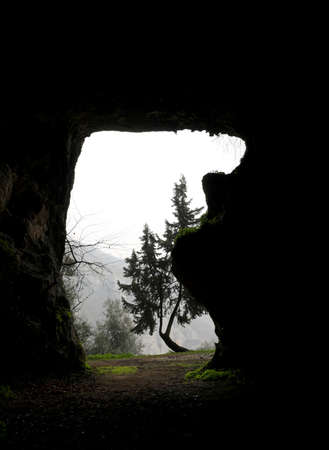 opening in the cave entrance with the extraordinary shape of a chess horseの写真素材