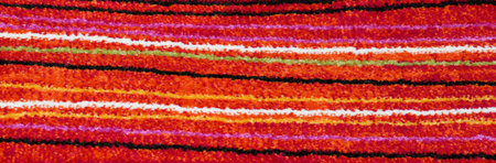 background of a chenille rug with horizontal stripes colored with bright colors