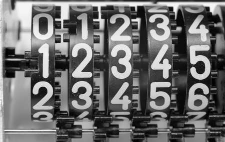 old analog meter with the white numbers from number one to fiveの写真素材