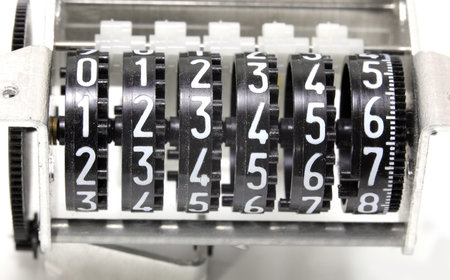 analog meter with the white numbers from number one to six