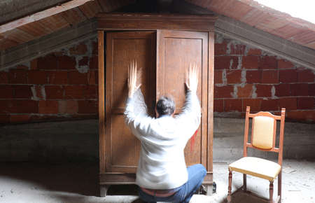 ghost of the house with a closet in the attic like a paranormal presenceの写真素材