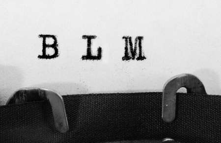 text BLM that means Black lives Matter on the old typewriterの写真素材