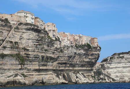 Awesome view with houses over the sea in the Bonifacio City in Corse Islandの素材 [FY310171960369]