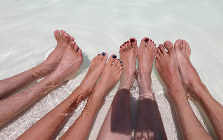 8 foot family of 4 relaxing on the shore