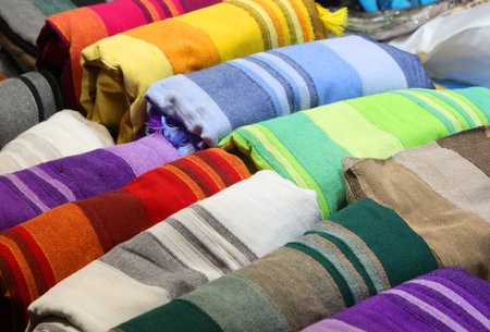 large assortment of plaids and home textiles for sale in the mall store