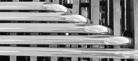 metallic gray stainless steel pipes in the industrial infrastructureの写真素材