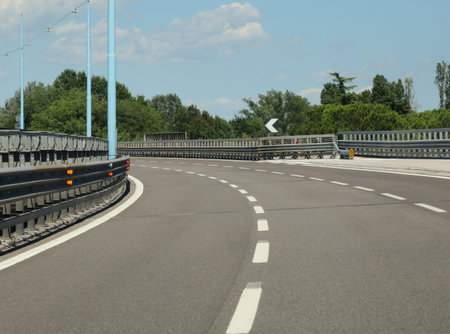 dangerous curve with poor visibility on the road without cars