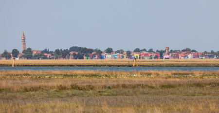 blurry view as a mirage due to the heat of the Town of Burano on venetian lagoon near Venice in Italyの写真素材