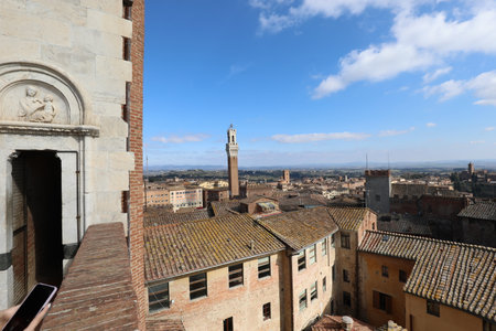 Tower of SIENA in ITALY Called TORRE DEL MANGIA from place called Facciatone of Cathedralの写真素材