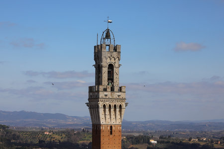 Ancient Tower of Siena City in Central Italy called TORRE DEL MANGIAの写真素材