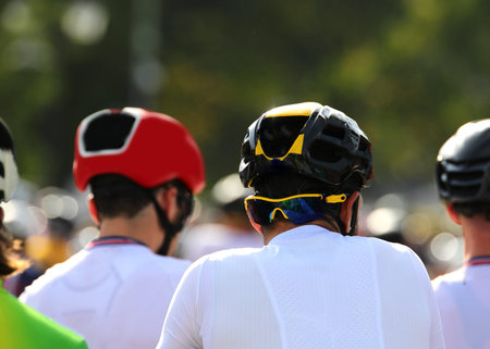 cyclist with helmet for head protection during the cycling race