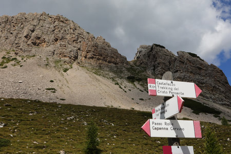 Indications on the mountain path with the locations written in Italian language in Northern Italyの写真素材