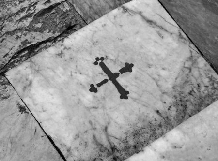 Step with the cross in the place where Saint Catherine fell pushed by the devil in the city of Siena...