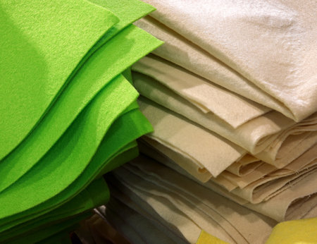 scraps of felt cloth and colored fabrics for sale in the fabric shopの写真素材