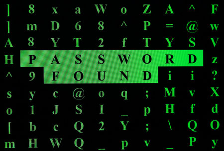 Green Text PASSWORD FOUND and random characters on black screenの写真素材