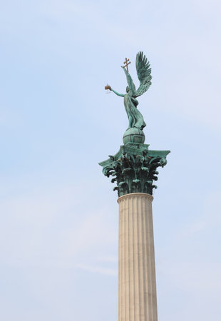 Columns and Statue of Gabriel Archangel with Holy Crown of Hungary in handの写真素材