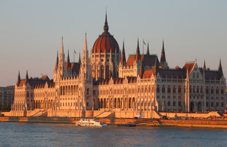 Budapest, B, Hungary - August 20, 2023: Hungarian Parliament building and the Danube River at sunsetのeditorial素材