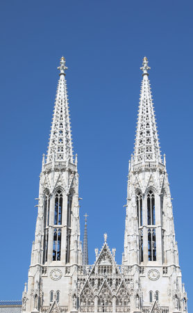 two Bell towers in Vienna Austria of the votive church called votivkirche in Austrian languageの写真素材