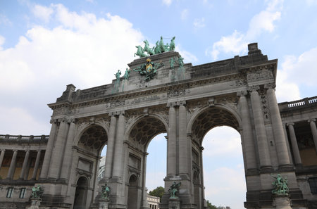 Brussels, B, Belgium - August 18, 2022: Cinquantenaire Arcade a memorial landmark arcade with four...