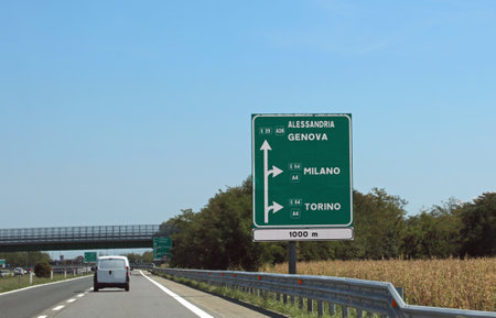 Motorway sign to go to the Italian French cities of MILAN also called Milan and other places in Northern Italyの写真素材