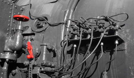 detail of the steam distribution system in an ancient train locomotiveの写真素材