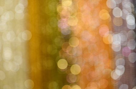 Gold blurred background perfect as a neutral backdrop for holidaysの写真素材