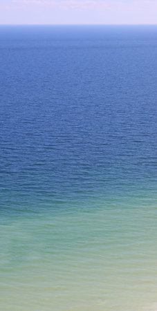 fantastic natural landscape with a beautiful sea in many shades of blue, perfect as a backdrop for...