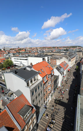 top view of northern European city with roofs and pedestrian avenueの写真素材