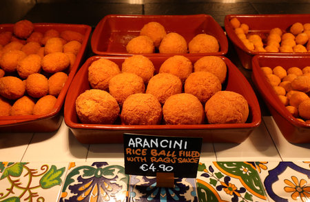 meat balls with vegetables called arancini a typical dish from sicily region of southern italy with...
