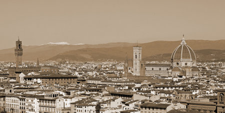 Wide view of Florence City in Central Italy with many famous landmarks like Tower of Old Palace and the Big Dome of The Cathedral with sepia old toned Effectの写真素材