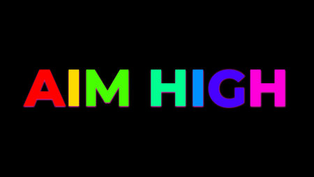 Big Text AIM HIGH with randomly colored letters with colors of the rainbow on black backgroundの写真素材