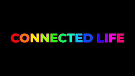 Big Text CONNECTED LIFE with randomly colored letters with colors of the rainbow on black backgroundの写真素材