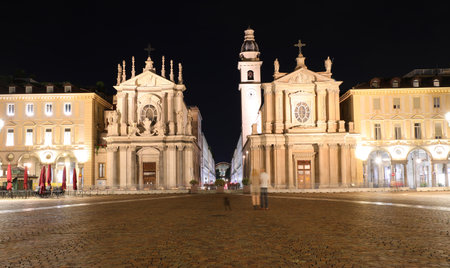 twin Churches in the wide square called Piazza San Carlo meaning Square of SAINT CHARLES in Turin City in Northern Italyの写真素材