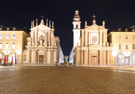 twin Churches in the wide square called Piazza San Carlo meaning Square of SAINT CHARLES in TURIN Turin in Northern Italyの写真素材