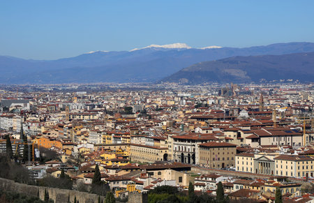Wide View of City Florence in Central Italy and Italian Apennines Mountains in the backgroundの写真素材