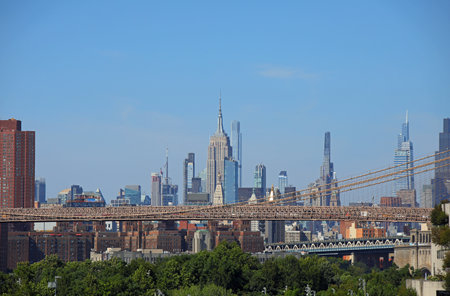 New York City skyscrapers skyline seen from Brooklyn Bridge and queensboro bridgeの写真素材